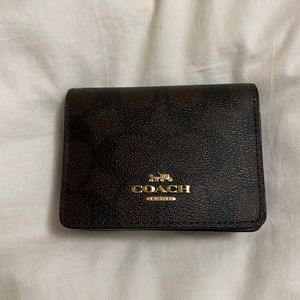 Mini Coach wallet on a chain